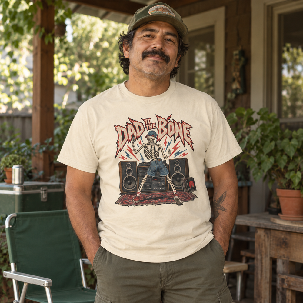 Dad wearing Dad to the Bone on a porch with a plain green chair